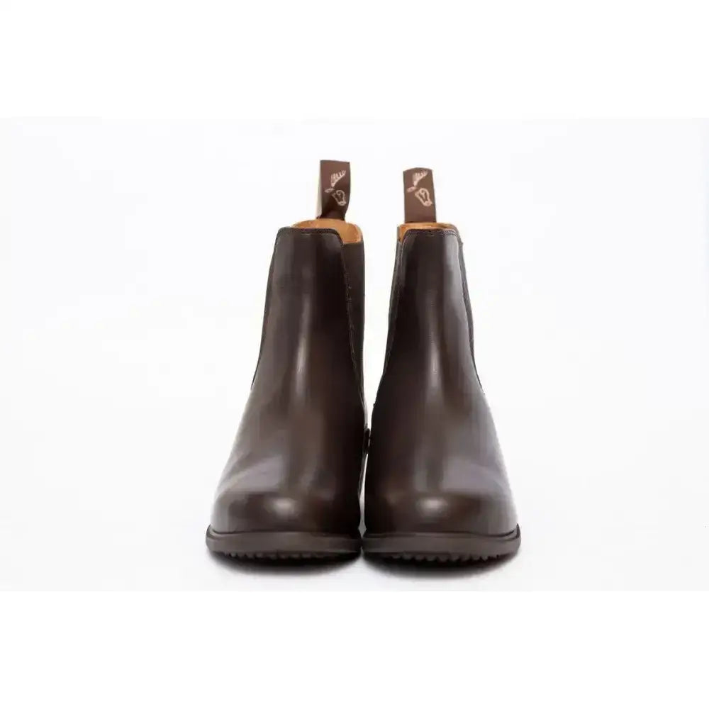 A pair of dark brown leather paddock zip boots with smooth polished finish and elastic side panels for kids elegance leather paddock
