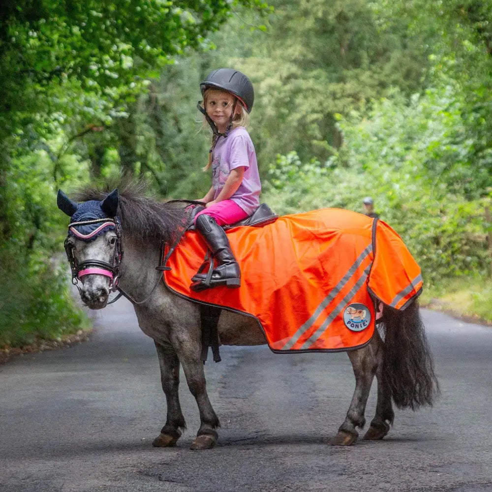 Bright orange retro reflective mesh exercise sheet with gray stripes and tail flap on small pony
