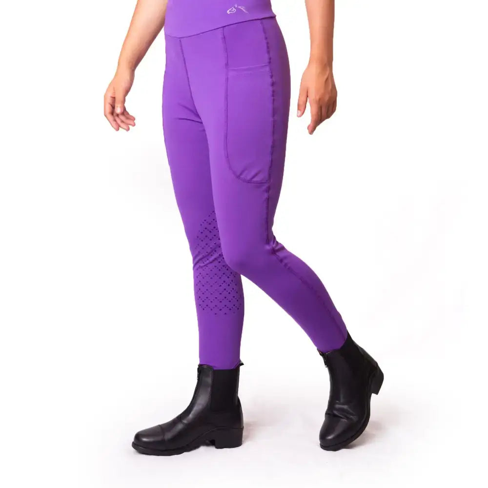Purple gallop riding stretchy leggings with pockets silicone knee and subtle perforated pattern for riding comfort