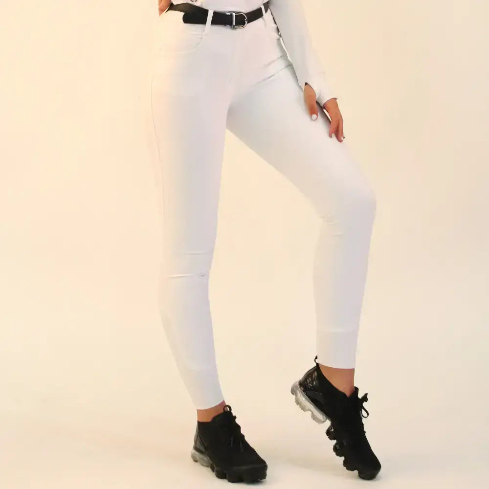 White gallop riding stretchy leggings boast pockets silicone knee grips and a sleek high waisted fit