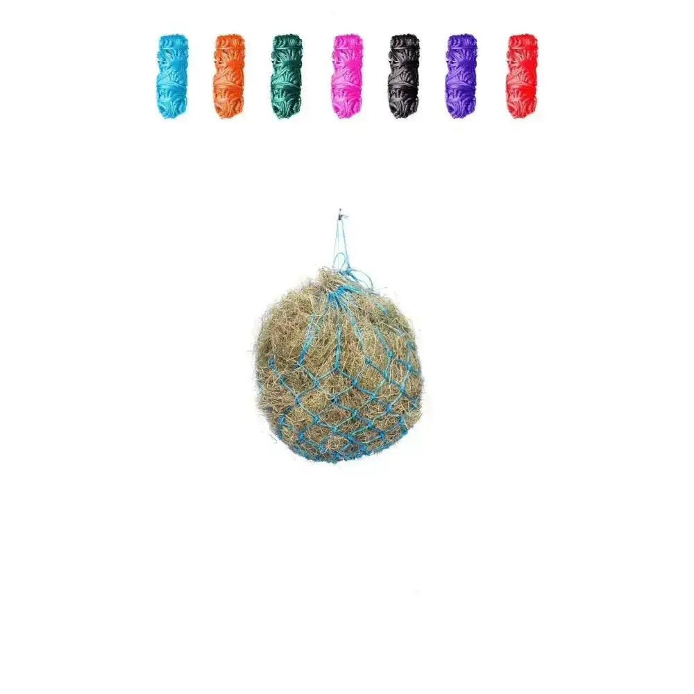 A round beige hay ball hanging in light blue netting strap on a gallop small haynet for small ponies horse feed