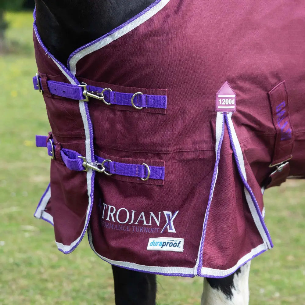 Maroon gallop trojan xtra lightweight turnout rug with purple straps and white trim for all-weather use