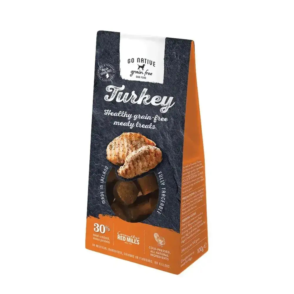A bag of go native essentials native essentials treats turkey dog snacks in dark blue and orange packaging for fun owner bonding