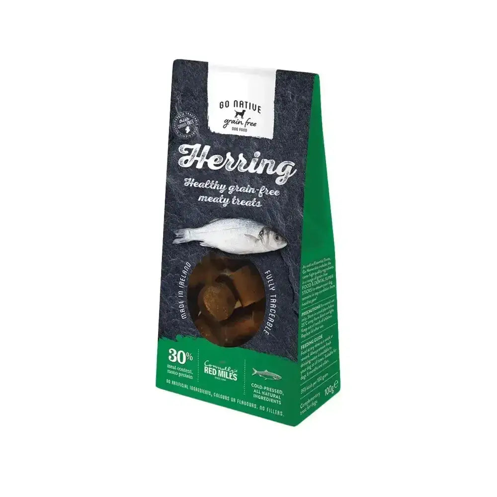 A dark green and black bag of go native essentials grain-free herring treats with a clear window for fun owner dog relationship