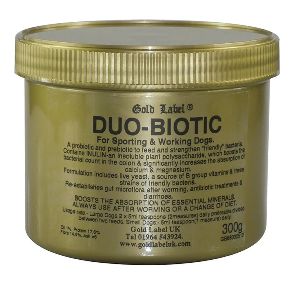 Gold label canine duo-biotic dog supplement in a metallic gold jar with ribbed lid and black printed label