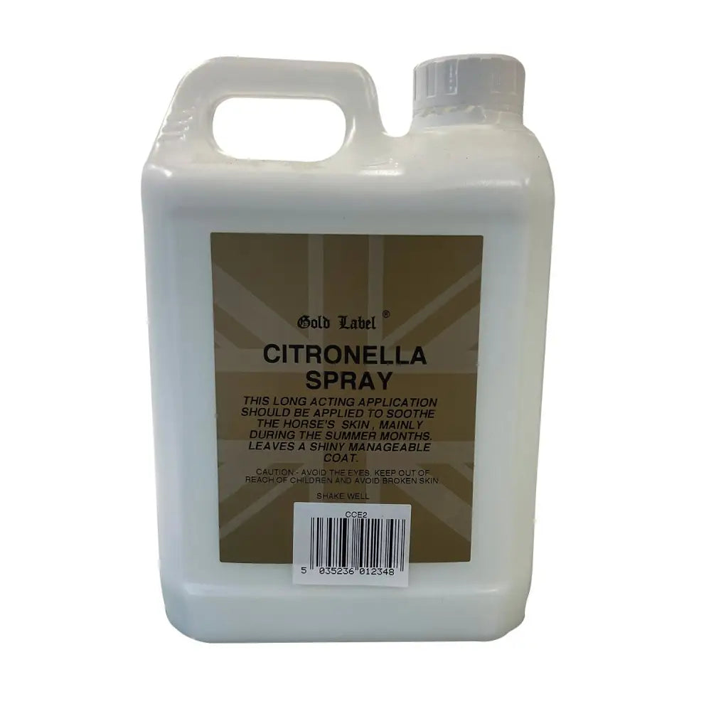White plastic jug with handle and screw cap labeled gold label citronella spray ultimate alternative product for horse grooming