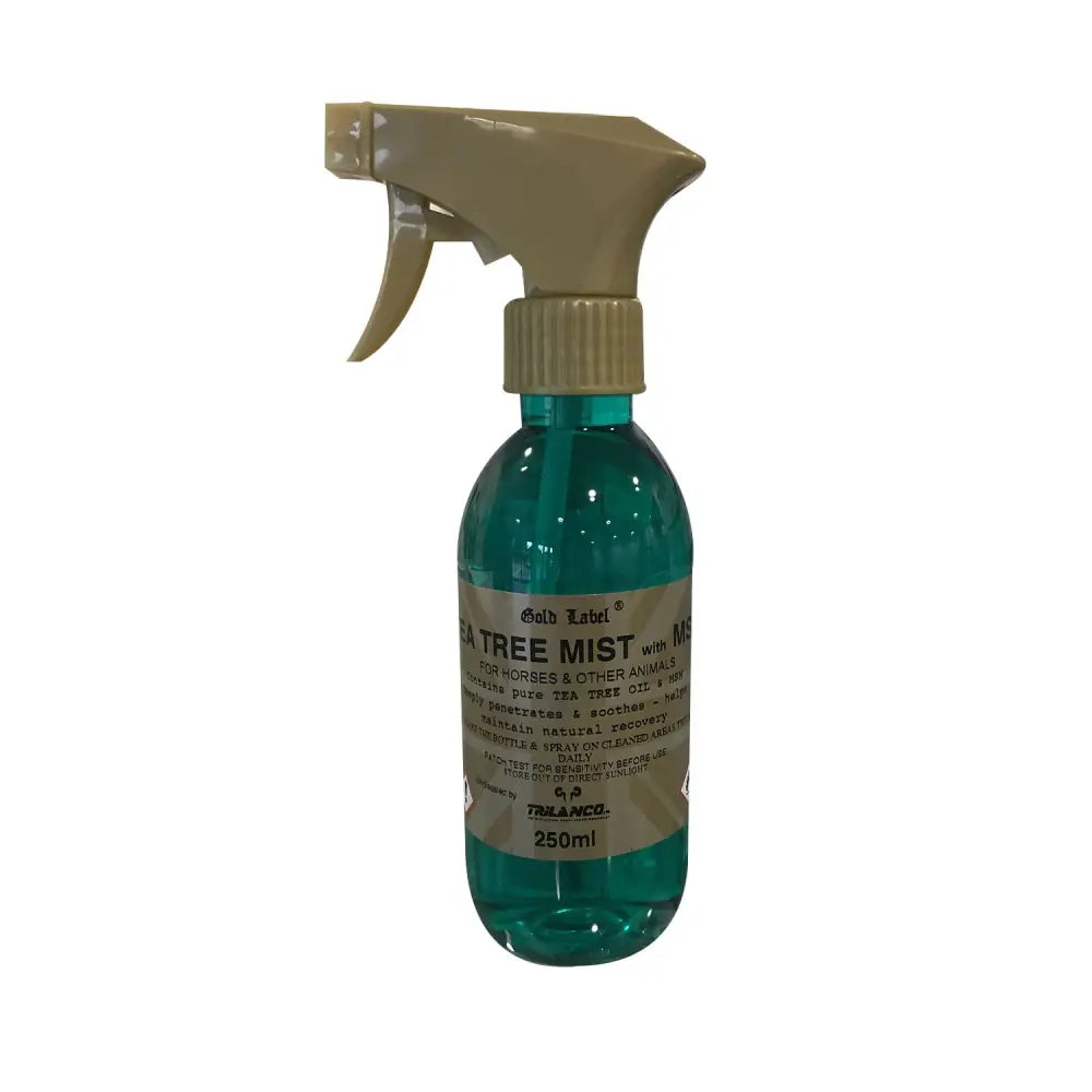 Gold label tea tree mist spray in a translucent teal bottle with beige trigger that deeply penetrates skin