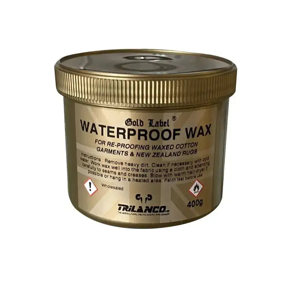 Gold label waterproof wax in a 400g tan container with ribbed gold lid for waxed cotton garments waterproof treatments