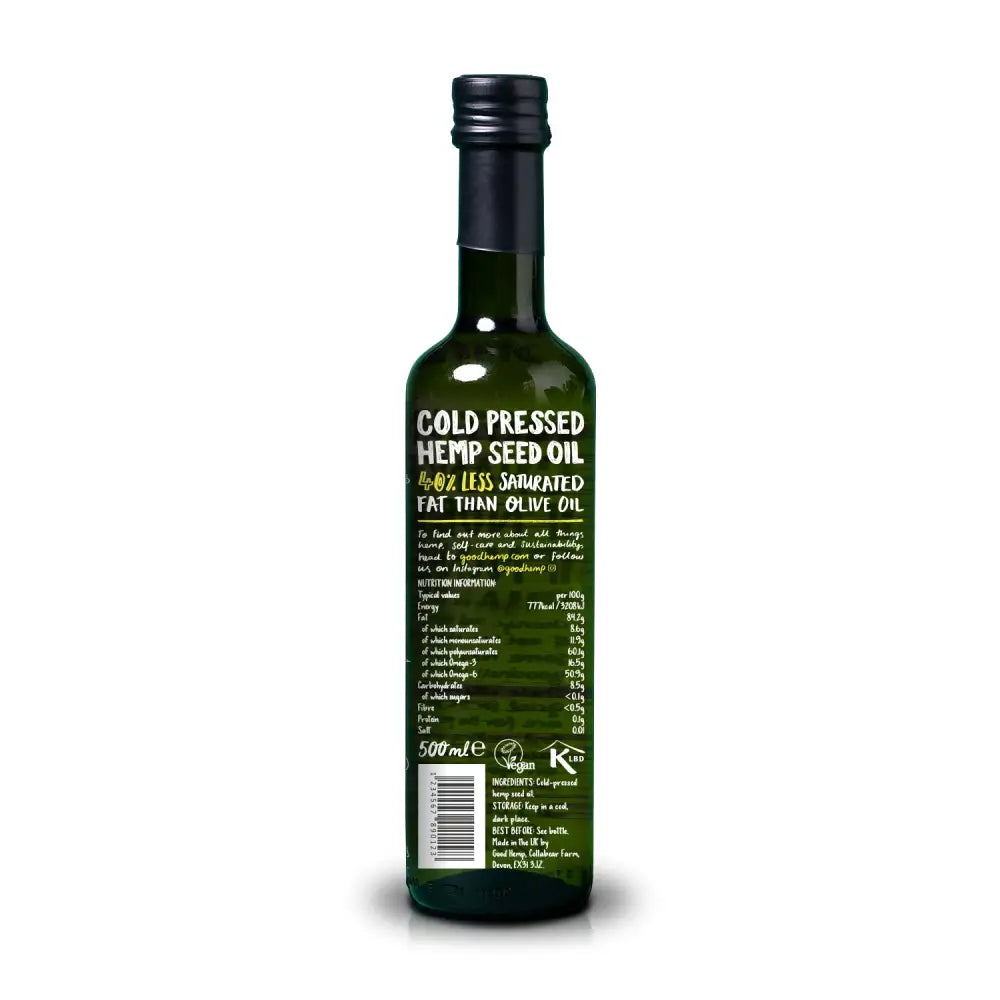 Dark green glass bottle of good hemp original hemp seed oil with black screw-top cap and white label