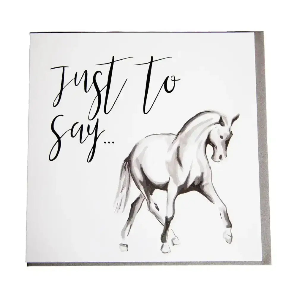A white gubblecote foiled greetings card with a black horsey illustration and just to say in elegant script