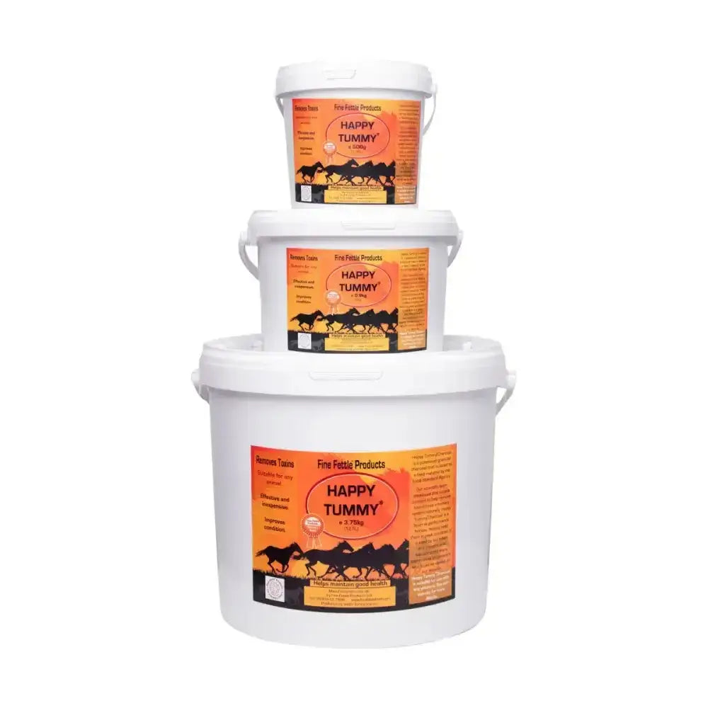 Three white plastic buckets of happy tummy charcoal horse vitamins with orange labels and black horse silhouettes