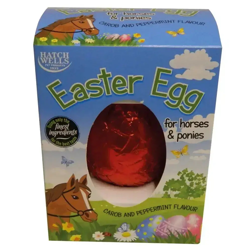 A glossy red egg-shaped horse easter egg treat in blue box with cartoon horses by hatchwells horse easter