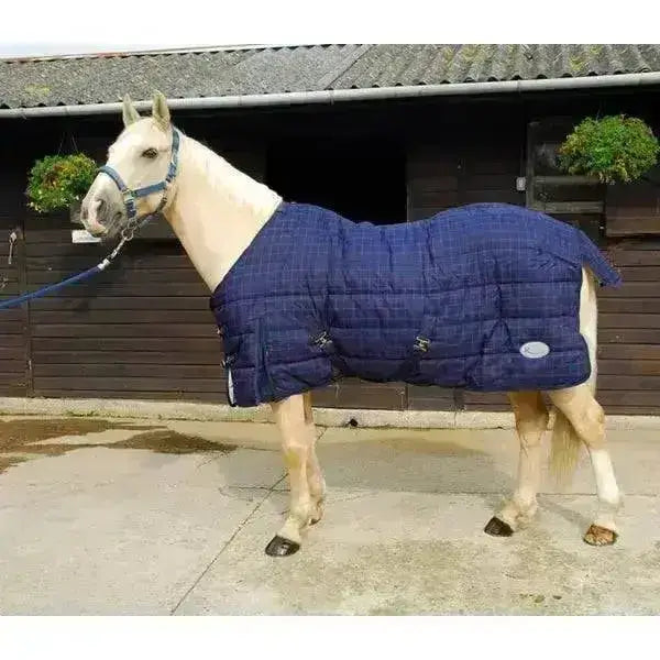 Blue quilted rhinegold orlando heavy weight stable rug with reinforced stitching and adjustable straps for secure fit