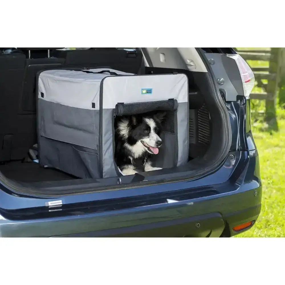 Gray and white henry wag folding fabric crate with petsafe logo and fabric mesh window for easy zip assembly