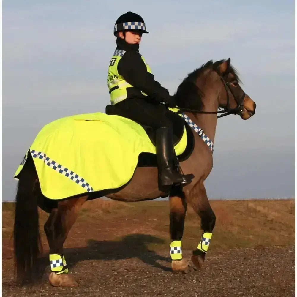 Bright yellow hi-vis equisafety polite winter exercise sheet with black and white checkered trim for winter use