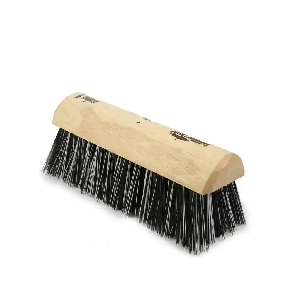 A hillbrush industrial stiff yard broom head with dense black and white polypropylene bristles and a natural wood handle