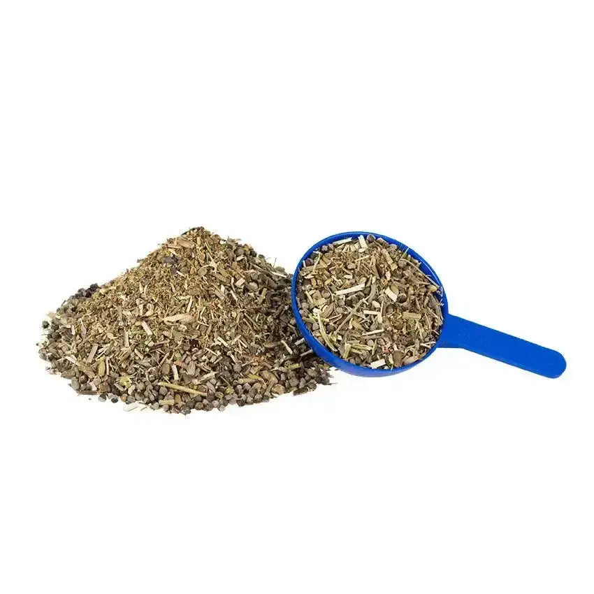 A blue plastic scoop filled with chopped herbs from hilton herbs easy mare horse hormone supplements for calm steady outlook