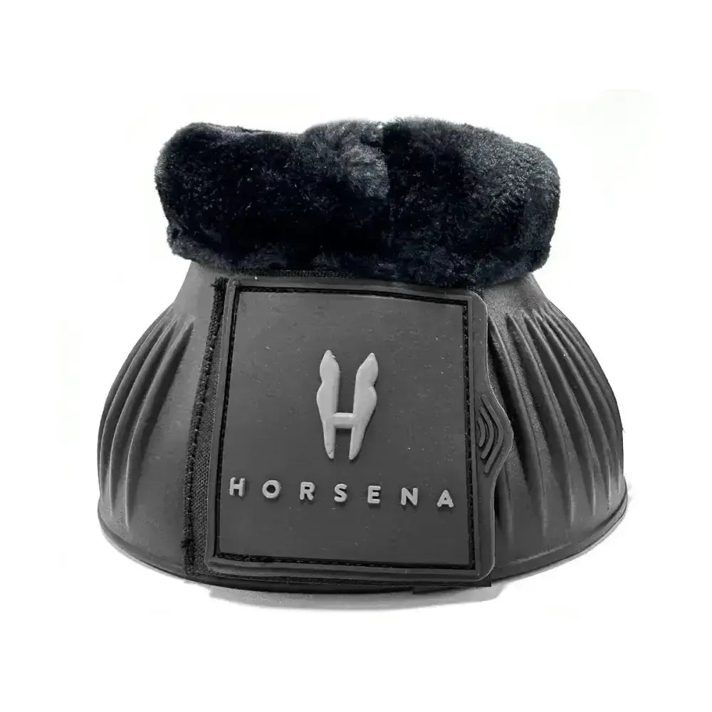 Black horsena pro-light reach boot with plush faux fur lining and textured ribbed exterior shown from the back side