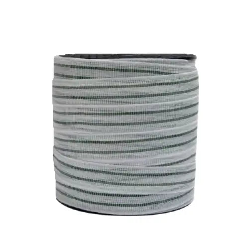 A spool of white hotline 40mm paddock electro tape with fine black stripes and steel conductors for paddock essentials
