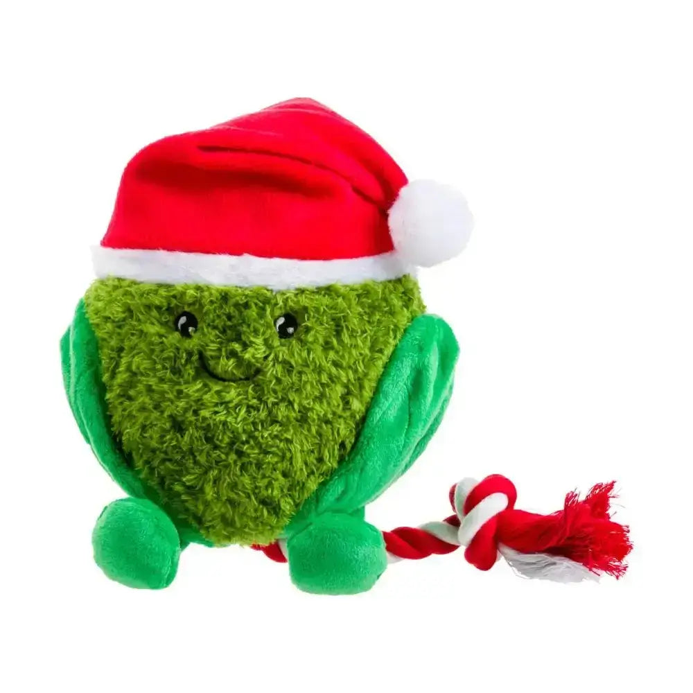 A plush green brussels sprout toy with a red santa hat and smiling face in the house of paws christmas rope toy