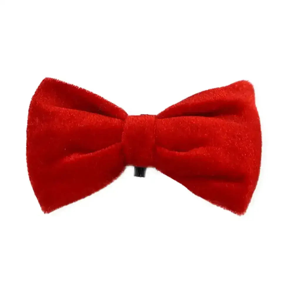 A vibrant red velvet bow tie with plush texture and stitched edges from house of paws paws christmas toy collection