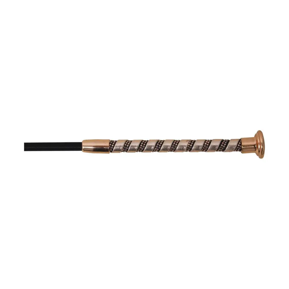 A sleek hy equestrian allure dressage whip with a twisted rose gold handle and black grip for dressage use
