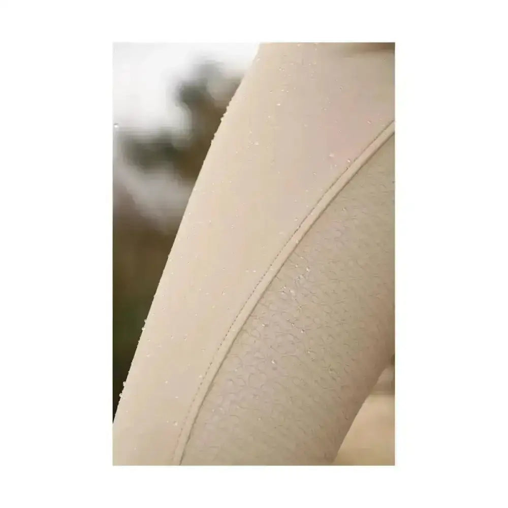 Beige sheer tights with smooth textured surface and subtle seam stitching for equestrian arctic polar softshell breeches water use