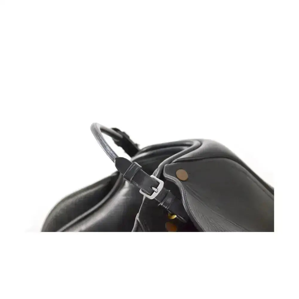 Black leather handbag with silver buckle and curved top handle featuring high quality rolled leather balance strap