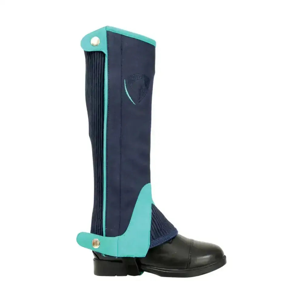 Navy synthetic equestrian belton children’s half chaps with teal ribbed fabric and snap closures for riding