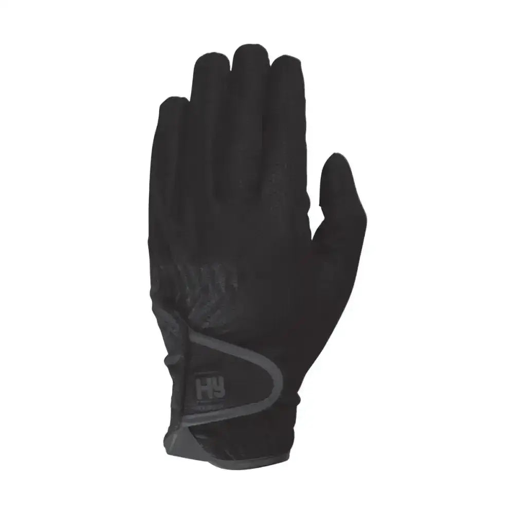 Black helly hansen equestrian cottenham elite riding glove with sleek fit and subtle gray accent stitching on back side