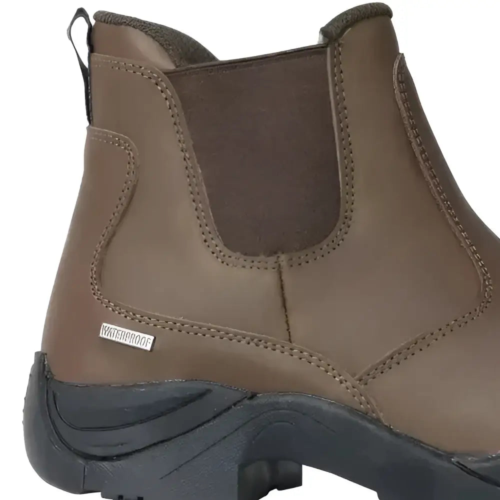 Brown waterproof pull-on boots with elastic sides and black soles from the hy equestrian crowden jodhpur boots range