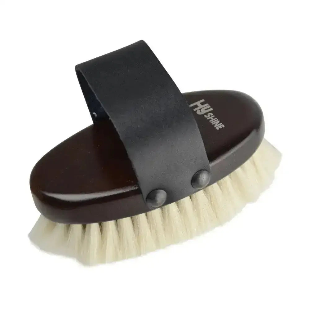 Dark brown wooden body brush with deluxe goat hair cream bristles and black leather strap by hyshine for equestrian use