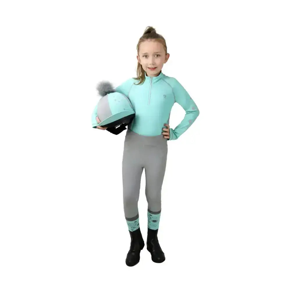 Mint green and gray equestrian dynamizs ecliptic helmet with fluffy pom-pom perfect for active equestrian use