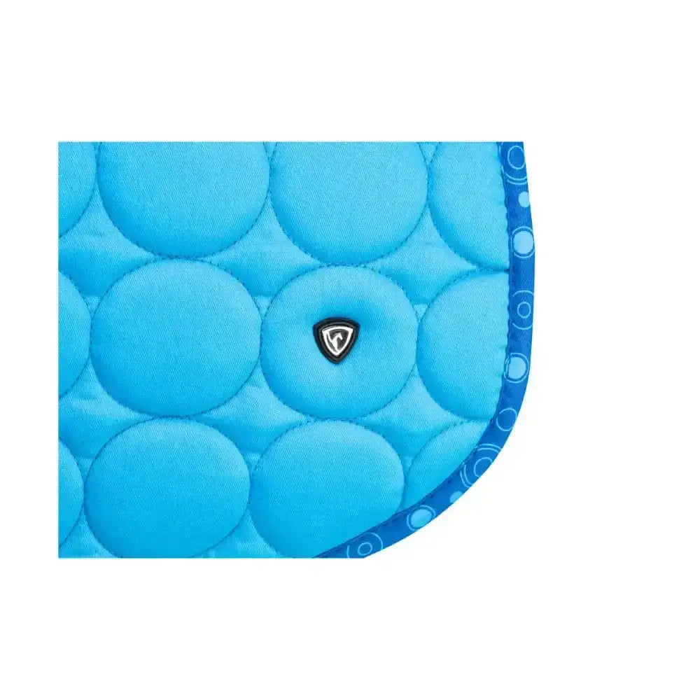 Bright blue quilted close contact saddle pad with circular padding and dark blue border from equestrian dynamizs ecliptic