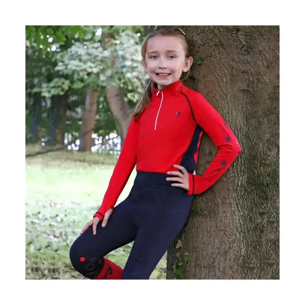 Red and navy blue hy equestrian dynamizs ecliptic riding tights with polka dot sleeves and red knee details