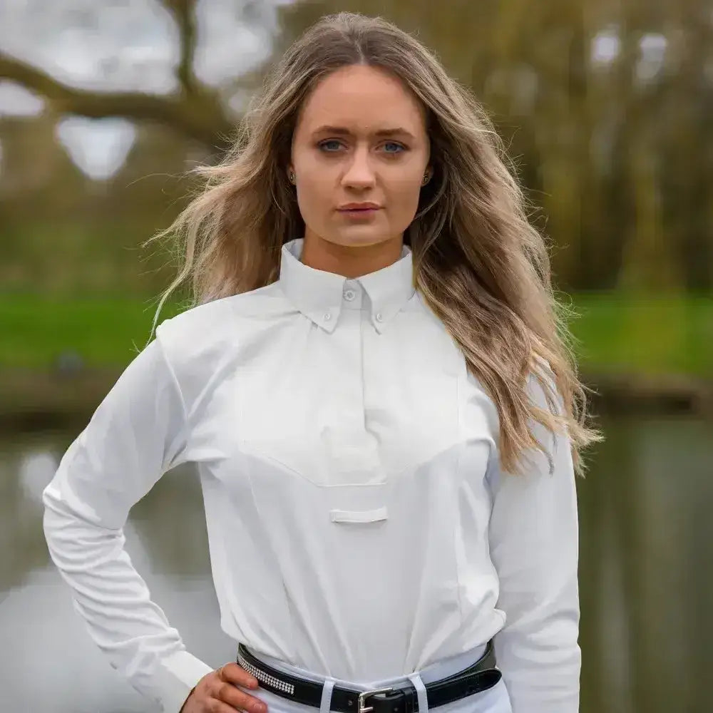 White long sleeved riding shirt with crisp collar and subtle front pocket detail from hy equestrian ladies dedham line