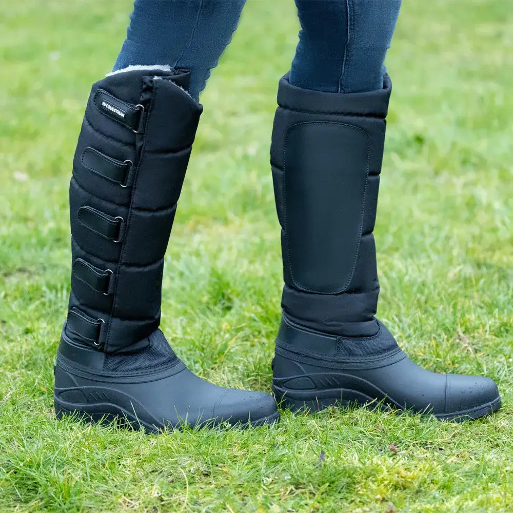 Black insulated equestrian litton winter boot with padded quilted shafts and adjustable strap closures