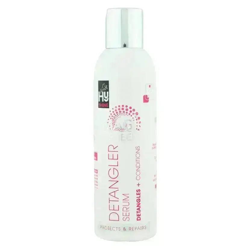White bottle of hyshine equestrian magic sheen detangler serum with silver cap and pink text on label