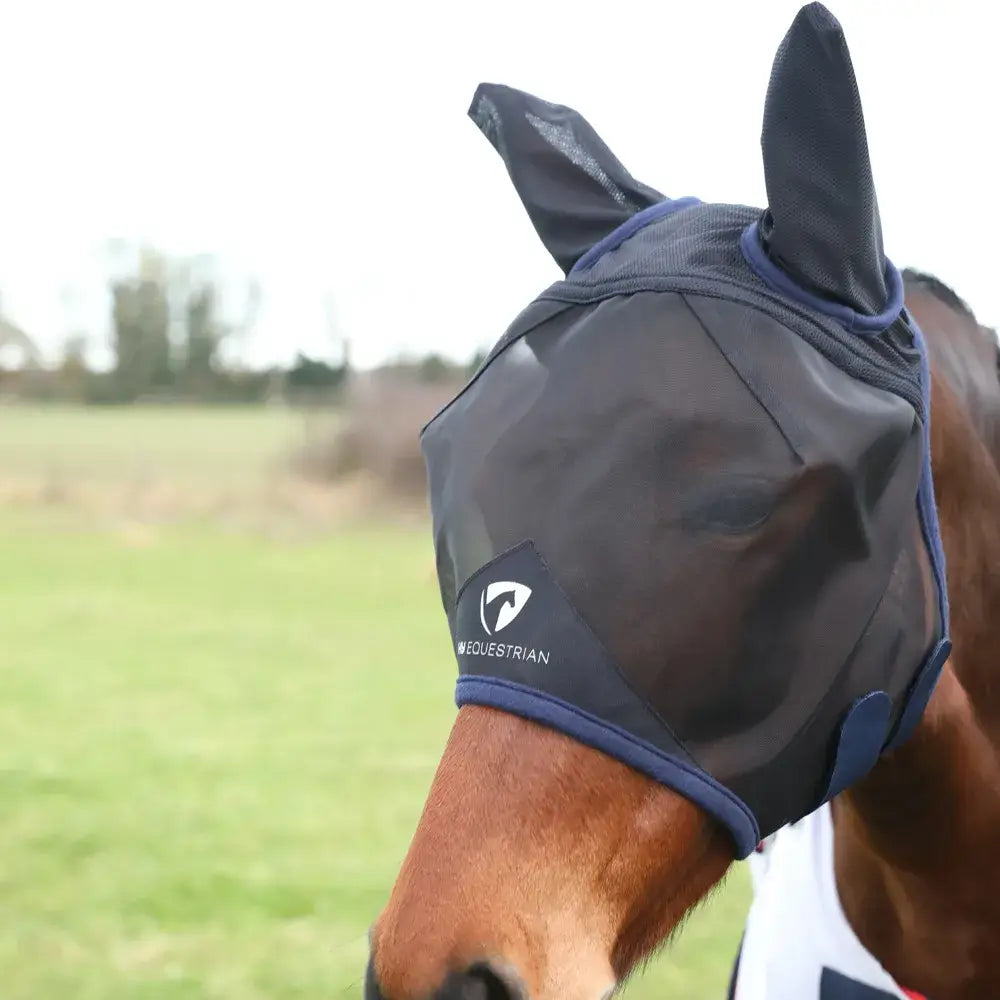 Black equestrian mesh half fly mask with ears featuring eye darts navy blue trim and white hy equestrian logo on side