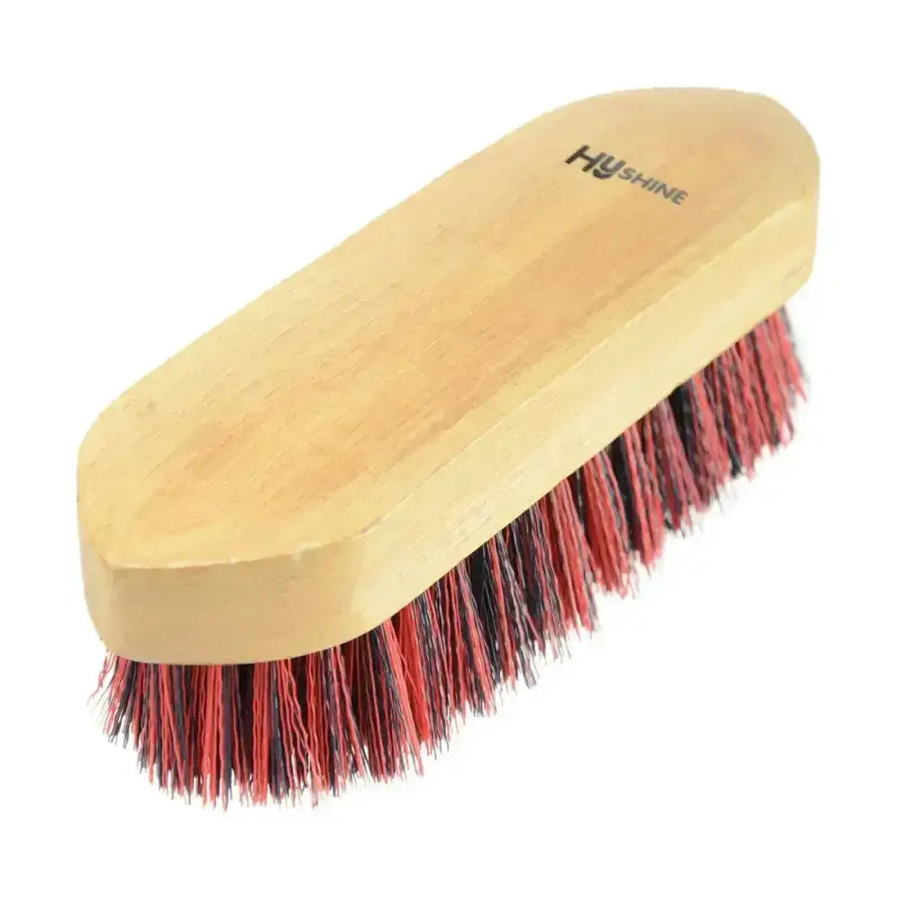 Light-colored wooden equestrian natural wooden dandy brush large with red and black bristles for grooming horses