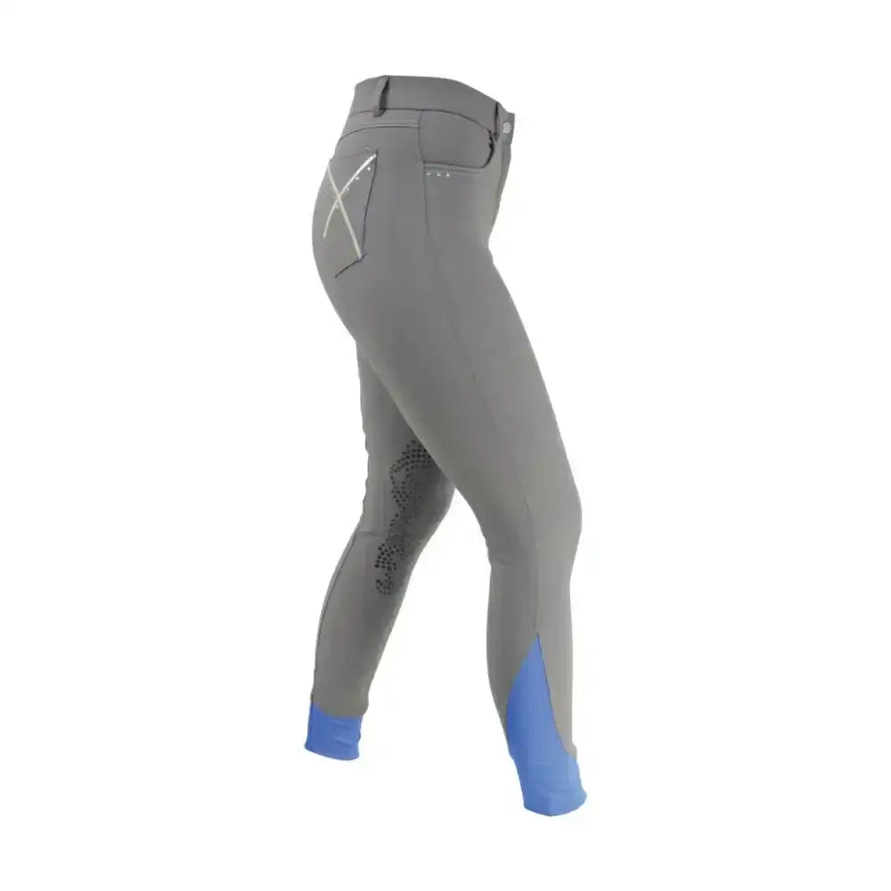 Back view of gray hy equestrian olympian ladies breeches with blue cuff accents and x shaped detail on pocket stylish breeches