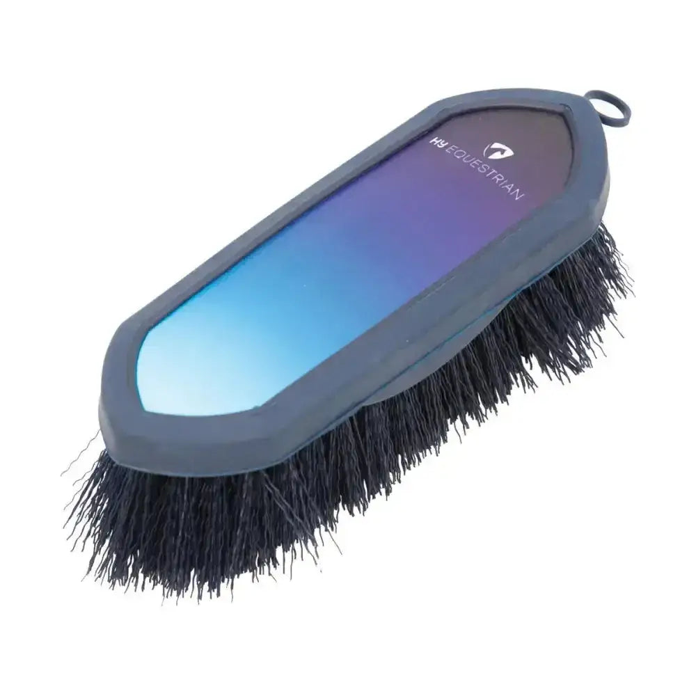 A sleek hy equestrian ombre dandy brush with gradient blue and purple plastic and black soft touch navy bristles