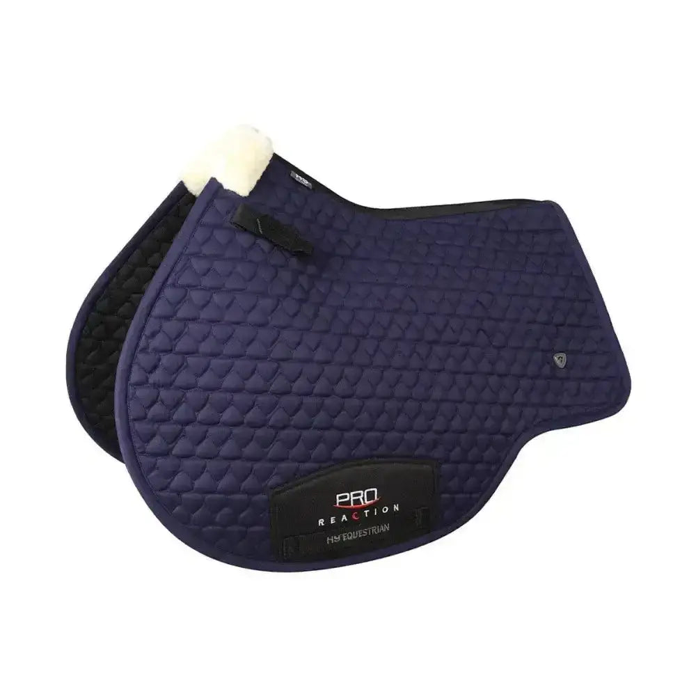 Navy blue quilted hy equestrian pro reaction close saddle pad with white fleece lining and black trim for ultimate performance saddle
