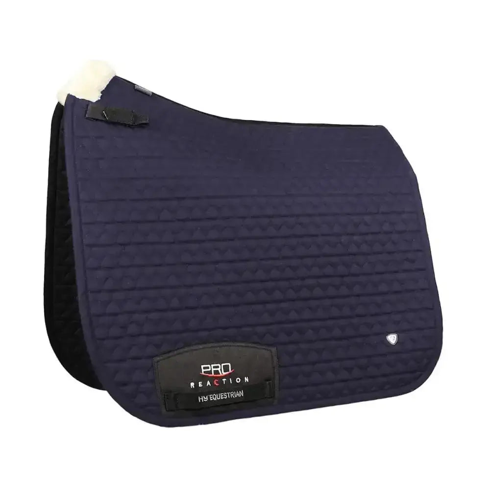 Navy blue quilted hy equestrian pro reaction dressage saddle pad with black trim and white fleece lining for ultimate performance dressage