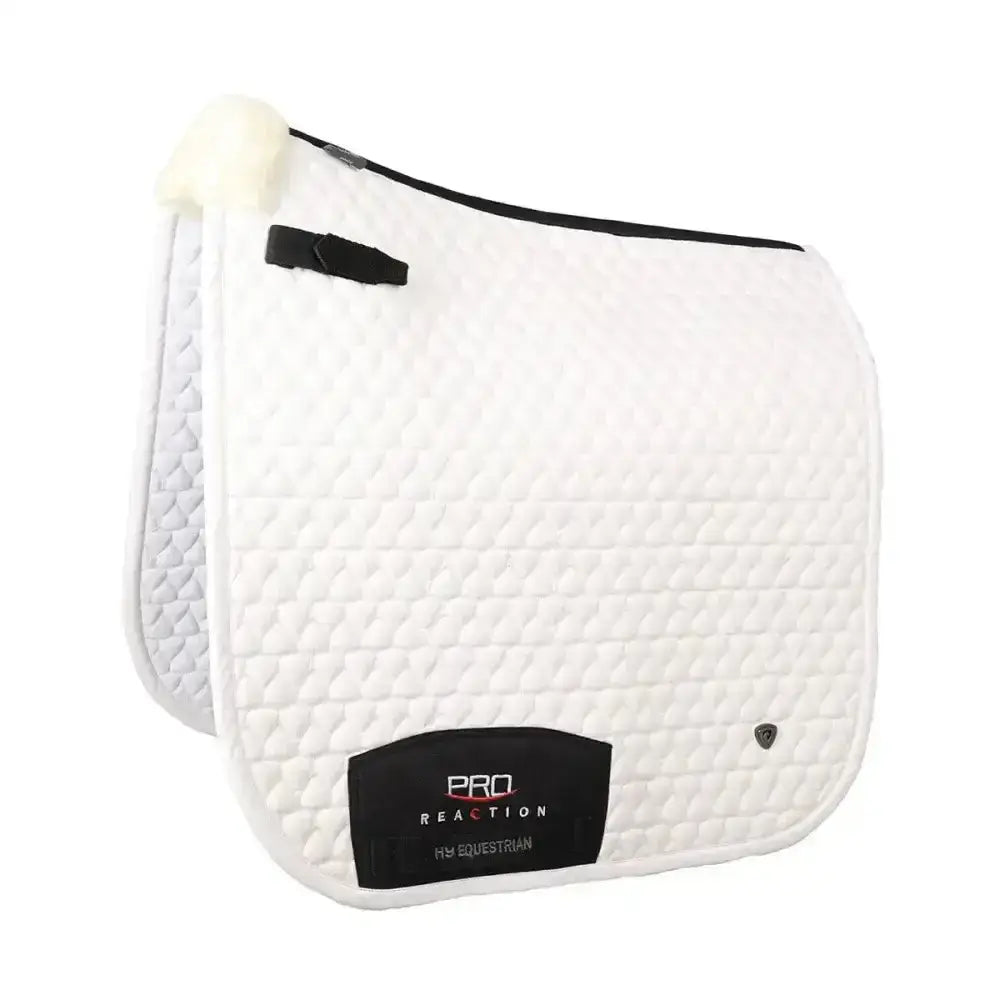 White quilted pro reaction dressage saddle pad with black trim and hy equestrian patch for ultimate performance dressage