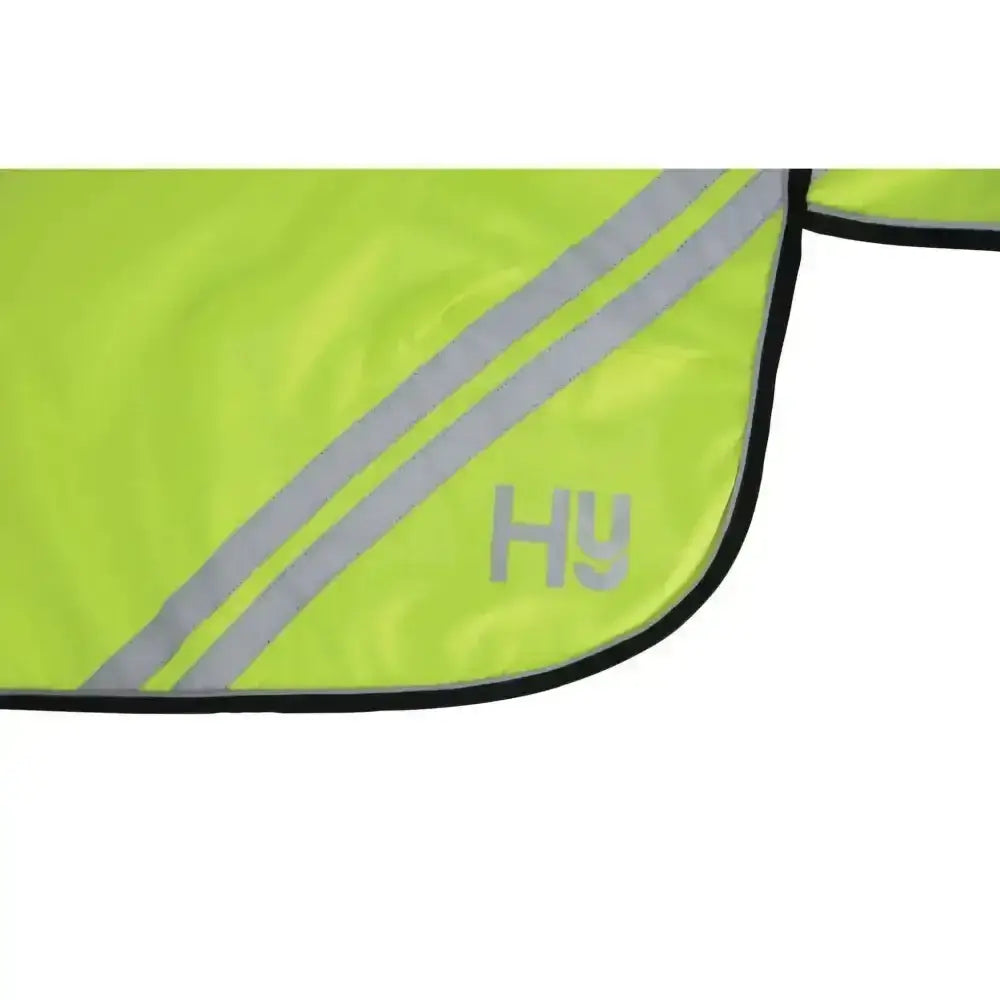 Bright lime green hy equestrian reflector mesh lightweight exercise sheet with silver stripes and black trim seen from back