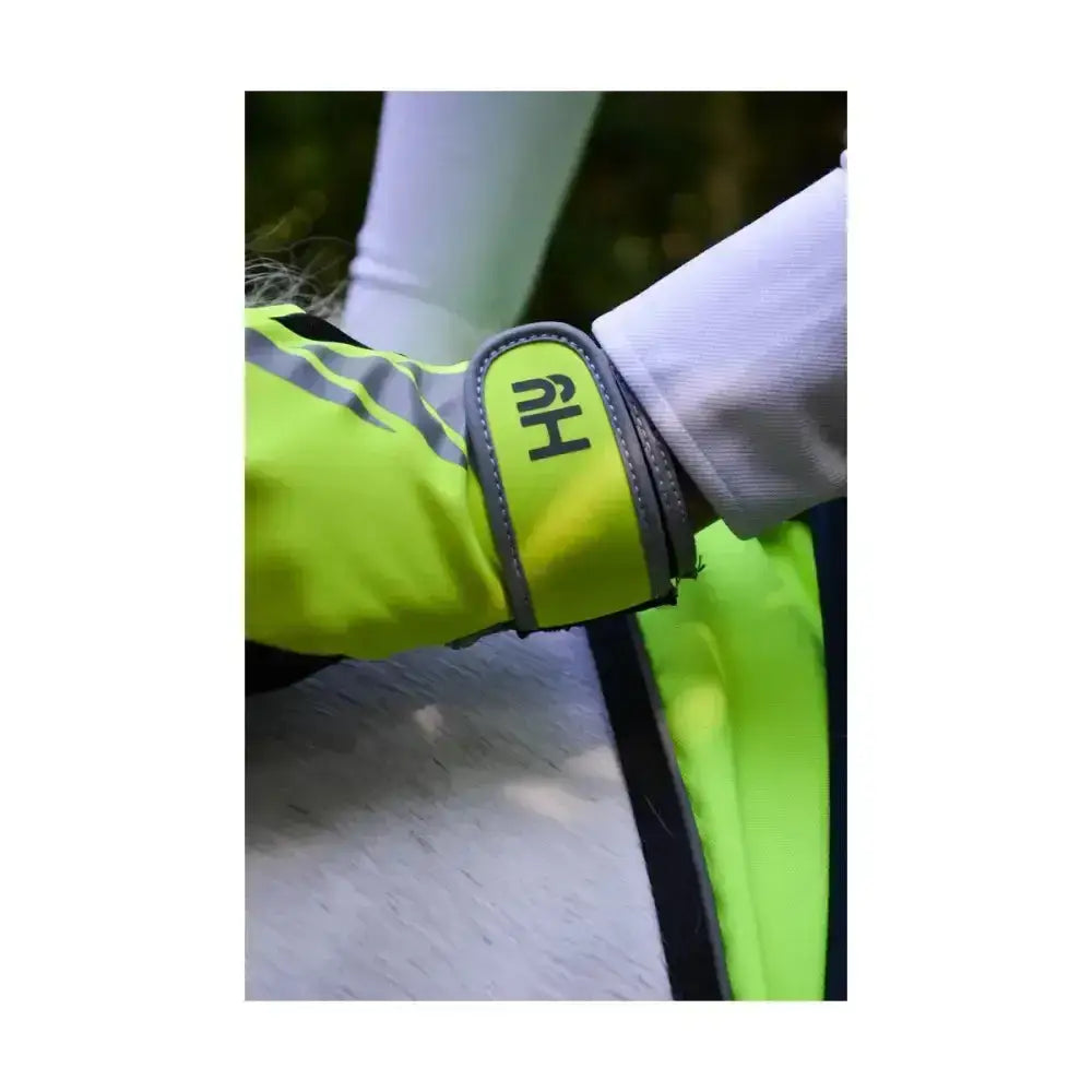 Bright neon yellow hy equestrian reflector riding gloves with gray trim and reflective detailing improves visibility