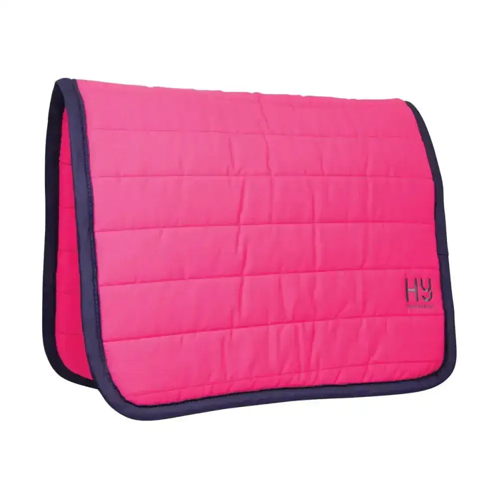 Bright pink hy equestrian reversible comfort pad with navy trim small hy logo fully reversible pad extra thickness
