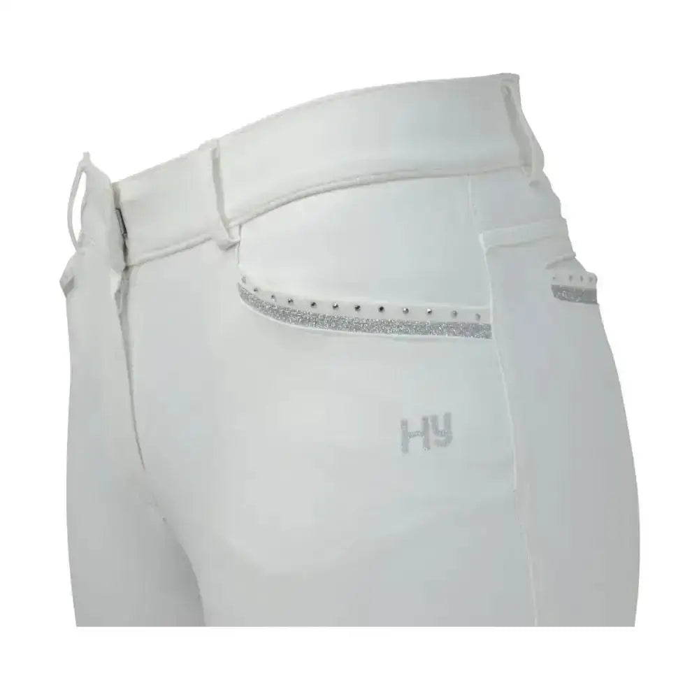 White equestrian roka crystal breeches with sleek tailored design silver glitter trim and subtle hy branding on pocket edge