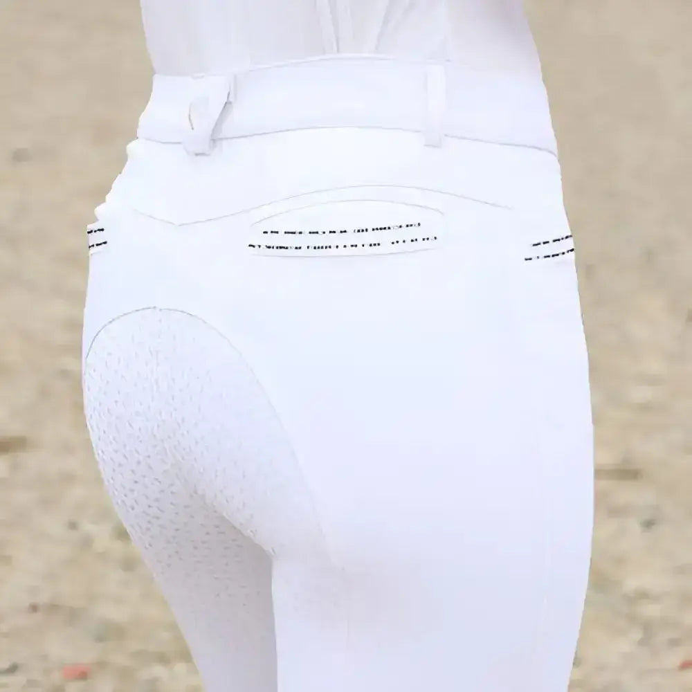 White equestrian roka rose breeches back view with smooth fit and subtle perforated detailing on pockets